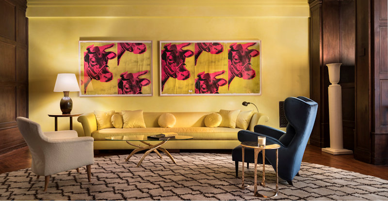 Photo of Andy Warhol's 1966 Day-Glo chartreuse and hot pink cow-head wallpaper