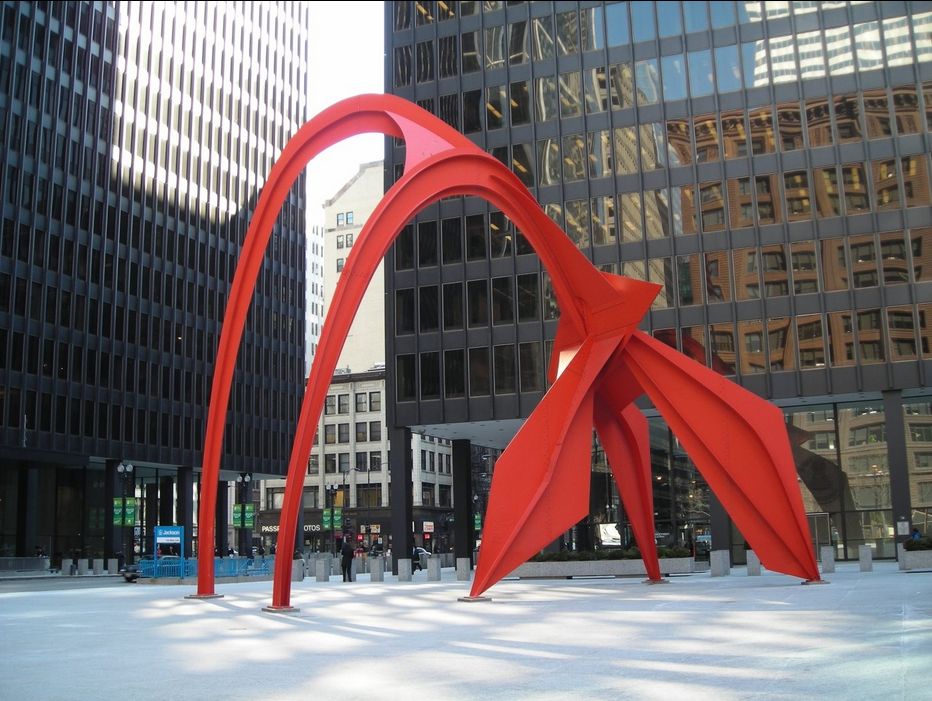 Photo of Flamingo sculpture, created by noted American artist Alexander Calder, a giant 53 foot (16 m) tall stabile located in the Federal Plaza in front of the Kluczynski Federal Building in Chicago, Illinois, United States