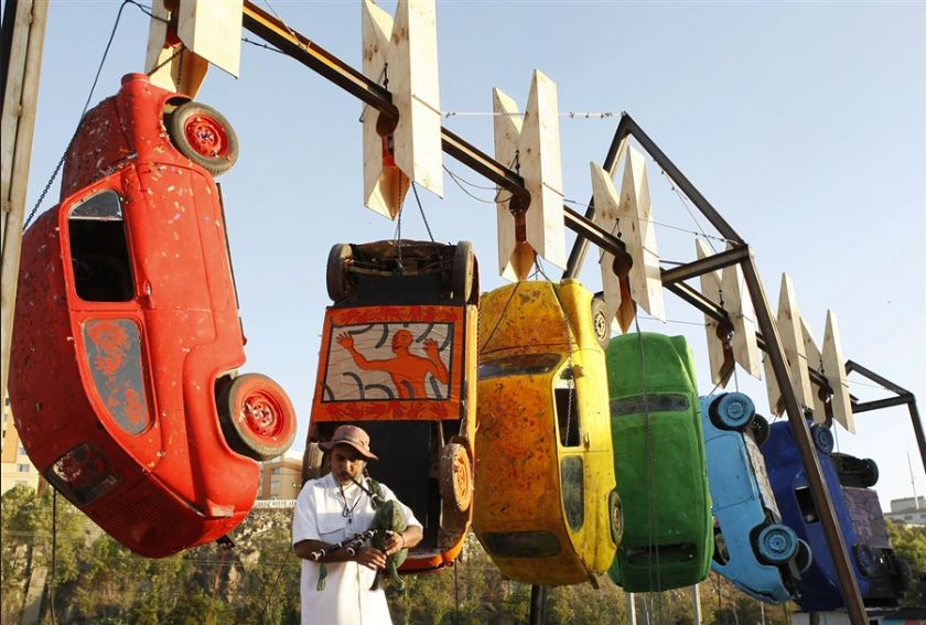 Image of custom made hanging sculpture mobile cars