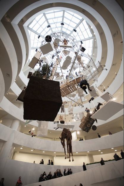 Image of hanging sculpture mobile Maurizio Cattelan guggenheim