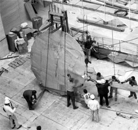 Photo of installation of Calder's White Cascade mobile