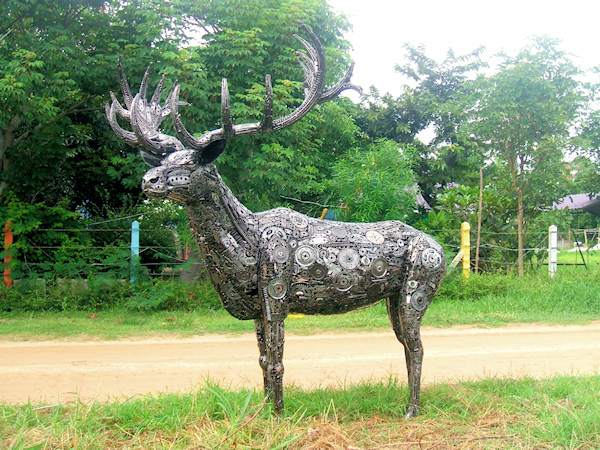 Buck deer sculpture made from recycled metal by Tom Samui