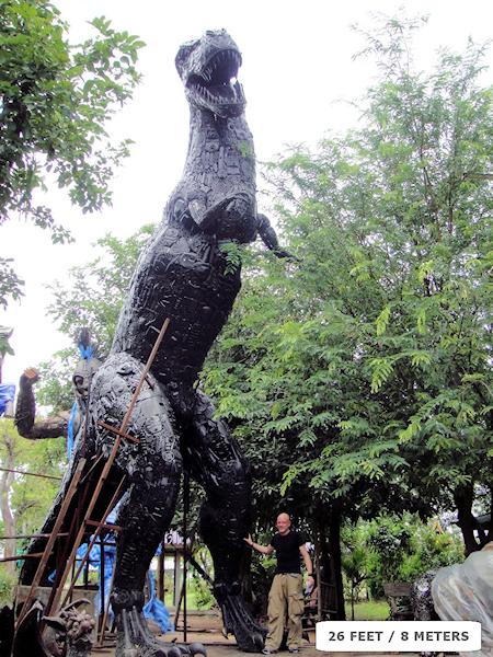 Dinosaur sculpture made from recycled metal by Tom Samui